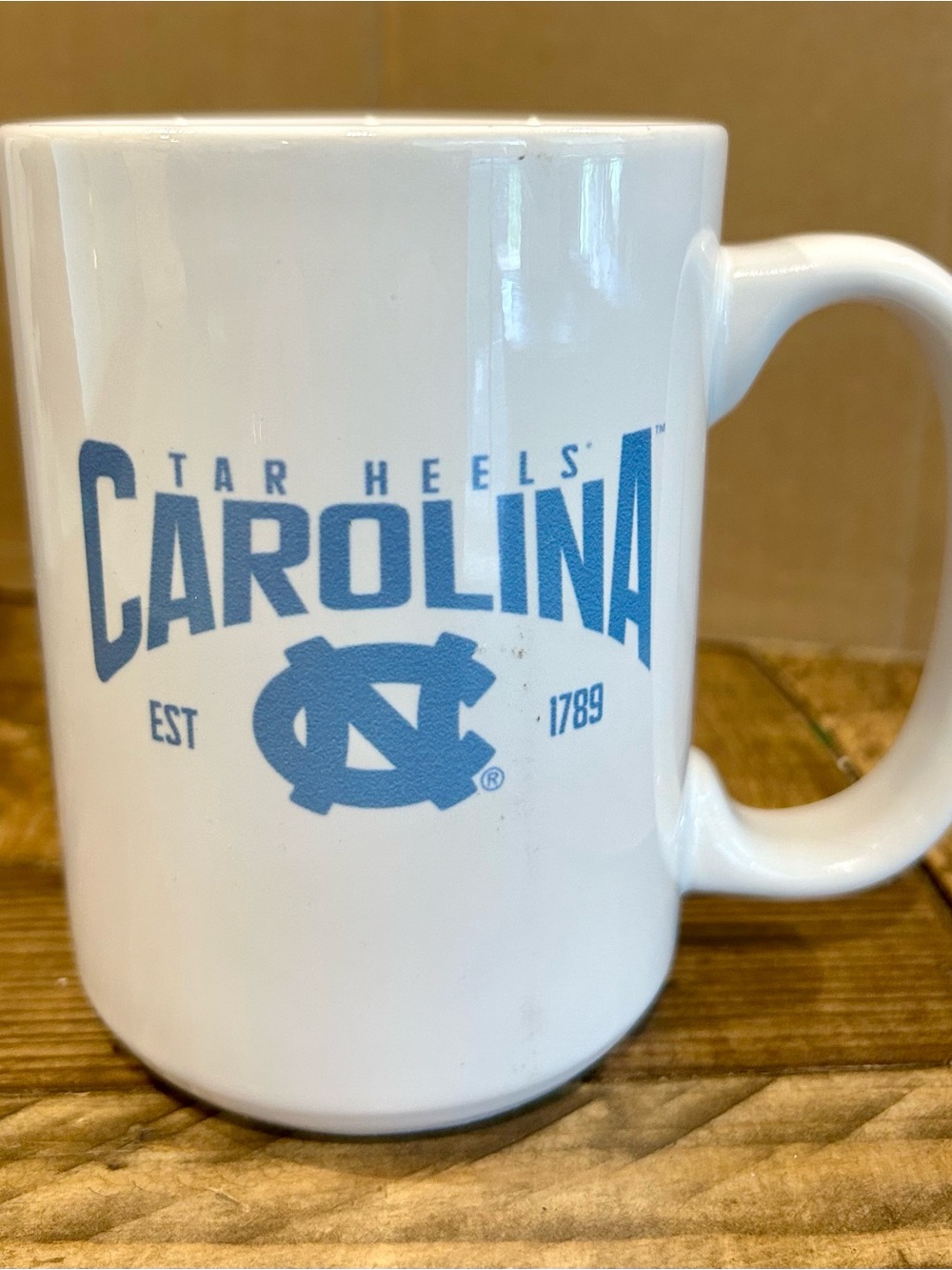 North Carolina Tar Heals White Ceramic Mug with Light Blue 'Carolina' Logo